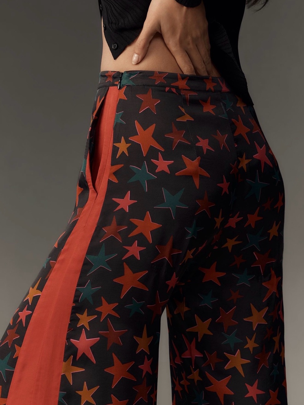 FARM x Anthropologie Rio Black Wide-Leg Star Print Pants with Red & Orange Stars - Picture 2 of 8